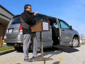 Nick Salaris, executive director of Lambton County Developmental Services, stands next to the agency's new accessible van on Nov. 12, in Petrolia. Terry Bridge/Postmedia Network
