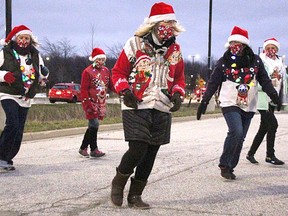 Participants in the 2020 Sarnia Kinsmen Santa Claus Parade at Lambton College. The annual event will once again be a 'drive thru' affair held at Lambton College on Nov. 27 from 4:30 to 8:30 p.m. File photo/Postmedia Network