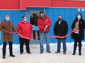 Living Space held the grand opening of its new facility on Spruce Street South on Monday. From left, Brian Marks, of CDSSAB, Living Space executive director Jason Sereda, Chris Renaud, a Living Space Outreach Worker, City Coun. Cory Robin, and Mickayla Bird, executive director of the Timmins Native Friendship Centre.

ANDREW AUTIO/The Daily Press