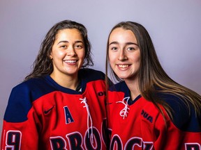 Carley Blomberg, left, and Ashley Robitaille, both members of the Brock University Badgers hockey team, have roots in Timmins.

Supplied