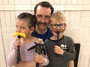 Dr. Mark Dickson of Tillsonburg, with the support of his daughter Josie (and Ken doll), son Thomas and wife Anna, has been raising funds for the 2021 Movember campaign. Dickson is also doing a one-month 1,000 chin-ups challenge. (Chris Abbott/Norfolk and Tillsonburg News)