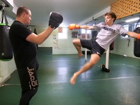 Jaxon Hillner, right, trains with coach Cody Martyn at The Pitt in LaSalette on Saturday. (Chris Abbott/Norfolk and Tillsonburg News)