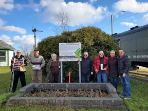 There have been many people who have had a part in making Cochrane the community it is. Last week, families of two of them came together to honour the farmers who were the backbone of the community. A plaque has been erected at the museum train to commemorate the Royal Winter Fair “Potato Kings” Gabriel Kolomeitz and David Hackett.  Bill Heavener spearheaded the project. He is with Phillip and Elaine Kolomeitz, Mayor Denis Clement, Jack Mann, Wendy Hackett-Lamarche and Dan Lamarche.