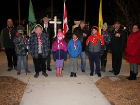 Veterans Steve Stamhuis, Kevin Rozema and Philip Paradis met with members of the 1st Leduc Scouting group at the cenotaph in front of Leduc Civic Centre Nov. 1. (Ted Murphy)