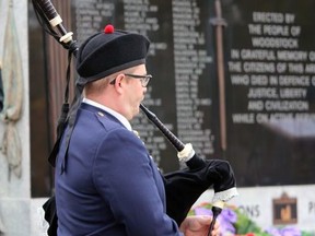 Piper Dylan Powell plays The Piper's Lament in front of the Woodstock cenotaph as part of the city's 2021 Remembrance Day ceremony.
(BRUCE URQUHART/Sentinel-Review)
