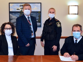Representatives from Oxford County's hospitals and police servies Ð from left to right, Sandy Jansen of Tillsonburg District Memorial Hospital andAlexandra Hospital Ingersoll, Perry Lang of Woodstock Hospital, Heidi Beck of the Woodstock Police Service and Anthony Hymer of the Oxford OPP ÐÊsign a new Police-Hospital Transition Protocol Agreement between the community partners.
SUBMIITED PHOTO