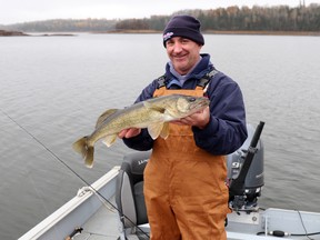 Rodney Castle with a nice walleye from the Winnipeg River. Late fall fishing is great if the weather cooperates.