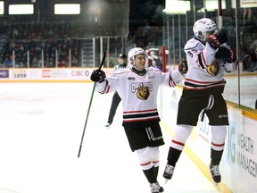 Rookie Colby Barlow celebrates with the fans after scoring the first goal of the game as the Owen Sound Attack host the Kitchener Rangers inside the Harry Lumley Bayshore Community Centre Saturday, Nov. 6, 2021. Greg Cowan/The Sun Times