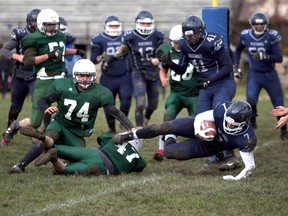 St. Mary's running back Nate Ryan crosses the goal line to score the Mustangs only touchdown en route to a 8-7 victory over the Grey Highlands Lions in the Bluewater Athletic Association senior football semifinal Thursday afternoon in Owen Sound. Greg Cowan/The Sun Times