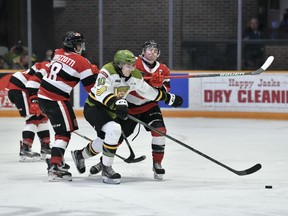 Michael Podolioukh of the North Bay Battalion advances the puck against the visiting Ottawa 67's in their Ontario Hockey League game Friday. Ottawa won 5-1 to hand the Troops a sixth consecutive loss. Submitted Photo