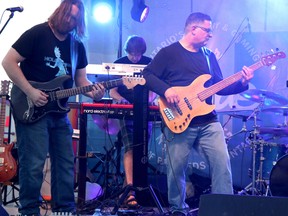 Machines Dream members Keith Conway, Brian Holmes and Craig West perform at Rotaryfest in July 2021. BRIAN KELLY