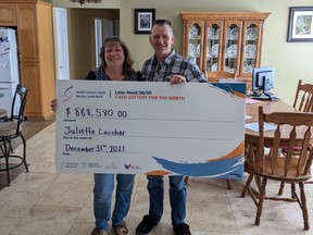 The lucky winner of the December HSN 50/50 $888,580 grand prize jackpot is Juliette Larcher of Hanmer, shown here with her husband, Jean-Marc Larcher. Supplied