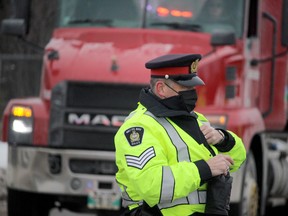 Sgt. Ray Magnan, head of traffic services of Sault Ste. Marie Police Service, participates in a Festive RIDE launch on Bay Street. POSTMEDIA