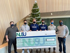 Nipissing University Student Union and Lakers Men's Volleyball Team are pictured with a cheque for the Movember Foundation. NUSU and Laker's volleyball teamed up to raise $2,855.

Submitted Photo