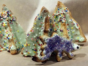 A cookie stegosaurus trudges through a forest of three-dimensional cookie trees. ELIZABETH CREITH