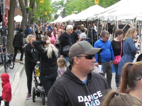 Sarnia is considering giving city staff authority to close city streets and parking lots for small-scale events. People are pictured during Artwalk crowding the city's downtown in 2018. (Paul Morden file photo)