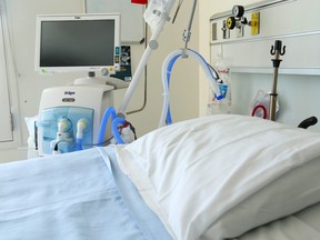 A ventilator stands beside a bed in the regional intensive care unit at Belleville General Hospital. Three of the six COVID-19 patients hospitalized there Monday were in intensive care.