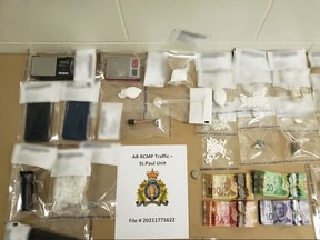 A number of drugs and cash were seized after a routine traffic stop went wrong. RCMP PHOTO.