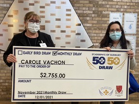 Barb Desjardins, vice-president of corporate services and chief financial officer for St. Joseph's of Sudbury, and 50-50 draw winner Carole Vachon.