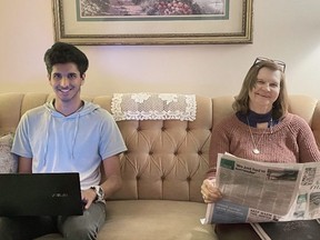 A.J. Dhananajay, from Singapore, relaxes with his landlord, Betty Cutting of Owen Sound.