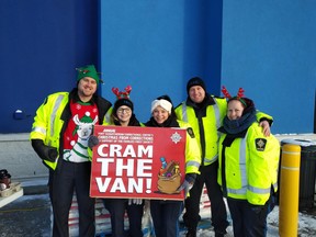Fort Saskatchewan Correctional Centre staff pictured hosting the Cram the Van fundraiser on Dec. 14, 2019. Photo Supplied, file.