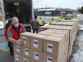 Grey County Paramedic Services and Transportation Services staff and Owen Sound Salvation Army representatives unloaded close to 9,000 pounds of bulk food at the Salvation Army headquarters on Friday.