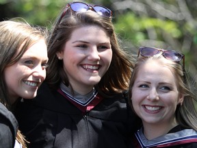 Meagan Gjos, Daniella Trevisanutto and Katie Goodall celebrate their graduation from Algoma University in June 2016. Algoma wants more of its students and faculty to learn and teach in other countries. BRIAN KELLY