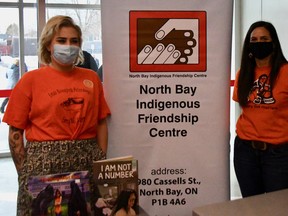 Presley Young, left, and Mair Greenfield staff a display in the Memorial Gardens concourse Sunday as the North Bay Battalion celebrated Indigenous Youth Day at its Ontario Hockey League game against the Barrie Colts.
Sean Ryan Photo
