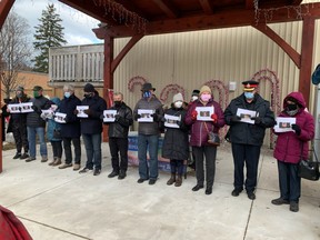 As the names of 14 women massacred because of their gender 32 years in Montreal were read aloud, volunteers at the annual Port Elgin Vigil Against Violence Against Women held photographs of the victims at a ceremony attended by approximately 100 people Dec. 6 in Coulter Parkette, Port Elgin.