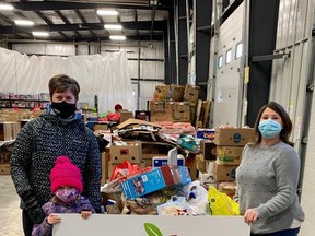 The Fort Saskatchewan Food Bank received several donations this week in support of its annual Christmas Hamper fundraiser, including a large donation from the U11/U13 Fort Saskatchewan Fury. Photo Supplied.