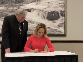 Jenny Alfandary, President and CEO of Westario Power, and George Bridge, Chair of Westario Power Board of Directors were in Walkerton on Dec. 7, to sign a Leadership Accord on Diversity, Equity and Inclusion. SUBMITTED