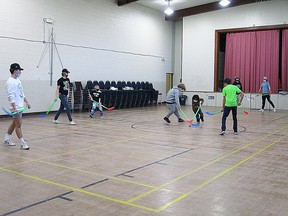 Kids and big brothers playing some floor hockey. (supplied photo)