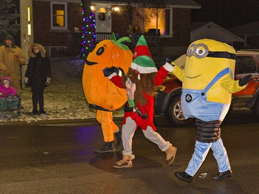 Costumed characters walk along St, James Street South in Waterford, Ontaro on Saturday December 18, 2021 during the town's first annual Santa Claus parade. Brian Thompson/Brantford Expositor/Postmedia Network