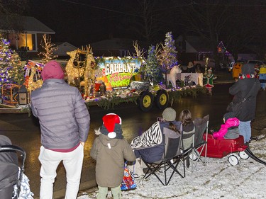 People lined St. James St. S. in Waterford on Saturday December 18, 2021 to watch about 45 entries roll past during the town's first annual Santa Claus parade. Brian Thompson/Brantford Expositor/Postmedia Network