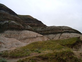 The Alberta badlands, where the boundary marking the end of the Age of Dinosaurs can be seen.