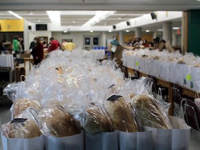 Bay Bundles are lined up ready to go as volunteers continue to pack them, last year, at St. Joseph-Scollard Hall. The Bay Bundles continue to be a hot Christmas commodity this year. They are now on sale.
PJ Wilson/The Nugget