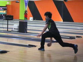 Austin Sands gets some practice in Saturday at Partners Bowling in North Bay. TGhe 16-year-old made the Northern Ontario team for the Youth Challenge, a national tournament, in Calgary in March.
PJ Wilson/The Nugget