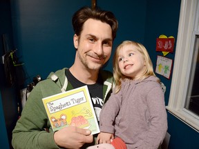 Former Zurich resident Gerard Creces, seen with his daughter Heather, just released his first book, The Spaghetti Tiger. Handout