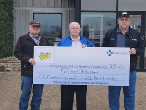 Presenting the donation for Joe Kerr Limited are Stuart Montgomery, John Thomson and Ray Wright SUBMITTED