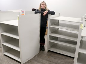 Lisa-Vezeau Allen helps Grocer 4 Good make the move from locations on Gore Street on Tuesday, Dec. 12, 2021 in Sault Ste. Marie, Ont. (BRIAN KELLY/THE SAULT STAR/POSTMEDIA NETWORK)