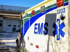 An ambulance waits outside the ambulance bay at the Foothills Medical Centre in Calgary on Monday, Dec. 6. GAVIN YOUNG/POSTMEDIA