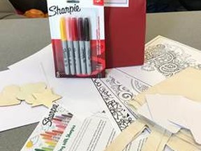 Some of the various kid’s and adult kits the Leduc Public Library has put together during the pandemic, including the very popular adult colouring kit. (Carla Frybort)