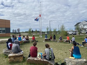 Students at Southpointe school witnessed the flags at half-mast in honour of the 215 child remains discovered at a Kamloops residential school. Photo by Carole Bossert / Twitter