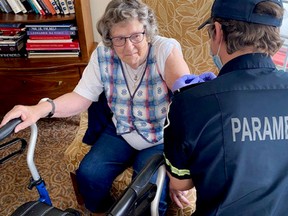 Doreen MacNicoll was among the residents of Bridlewood Manor in Brockville who received their first dose of COVID-19 vaccine from area paramedics on Wednesday, Mar. 24. (SUBMITTED PHOTO)