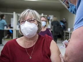Catherine Webster, a personal support worker at Carveth Care Centre in Gananoque, gets the COVID-19 vaccine at the Kingston Health Sciences Centre in January. (SUBMITTED PHOTO)