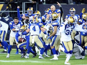 The Winnipeg Blue Bombers celebrate their victory during the 108th Grey Cup CFL Championship Game against the Hamilton Tiger-Cats at Tim Hortons Field on Dec. 12, 2021 in Hamilton.