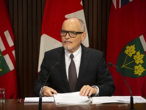 Dr. Kieran Moore, Ontario's Chief Medical Officer, attends a media briefing in Toronto on Monday, November 29, 2021.