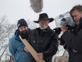 Filmmaker Graeme Bachiu, left, with freedom-seeker descendant Bill Douglas and director of photography Brian Marleau, while making the Canfield Roots documentary series in Canfield, Ont. (Supplied photo)