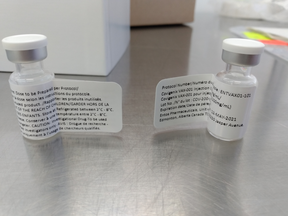 Vials of Entos Pharmaceuticals' COVID-19 DNA vaccine candidate Covigenix VAX-001 are prepared for Phase 2 clinical trials in South Africa, which are set to begin at 11 sites in the country in the new year. SUPPLIED