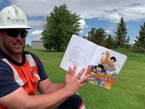 Wyatt from Fortis Alberta reads during a Mighty Machines video. Find all this year’s video on the APL website.